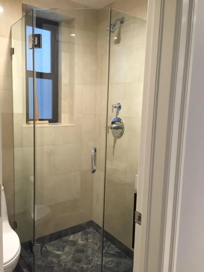 Neo-Angle shower door installed by ABC