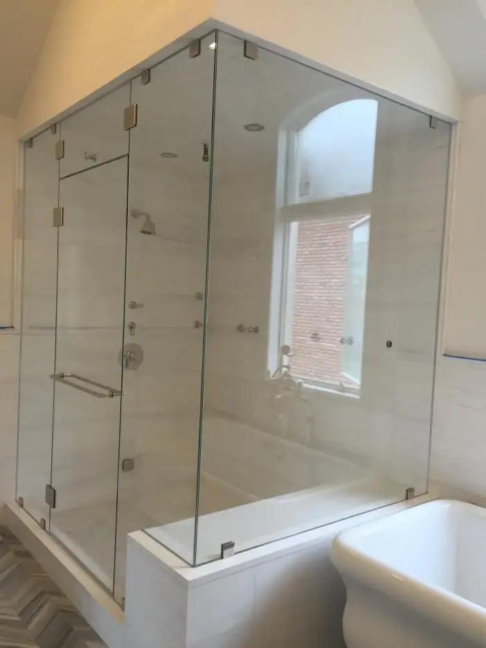 Corner shower door installed by ABC