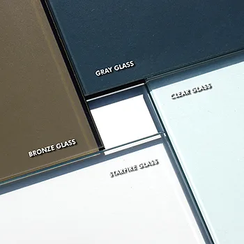 Sheets of bronze, gray, clear and Starfire glass overlapping, showing the colour of each at the edge
