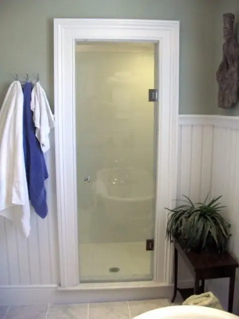 single door with knob in chrome hardware